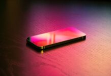 black smartphone on the table